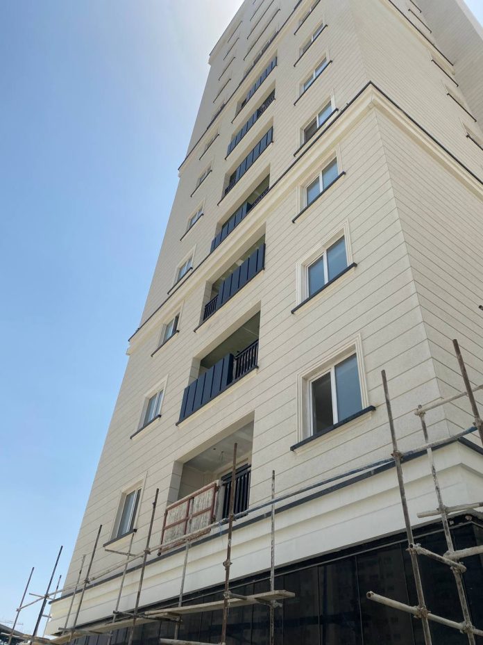 اجرای نمای ساختمان سیمان شسته در تهران